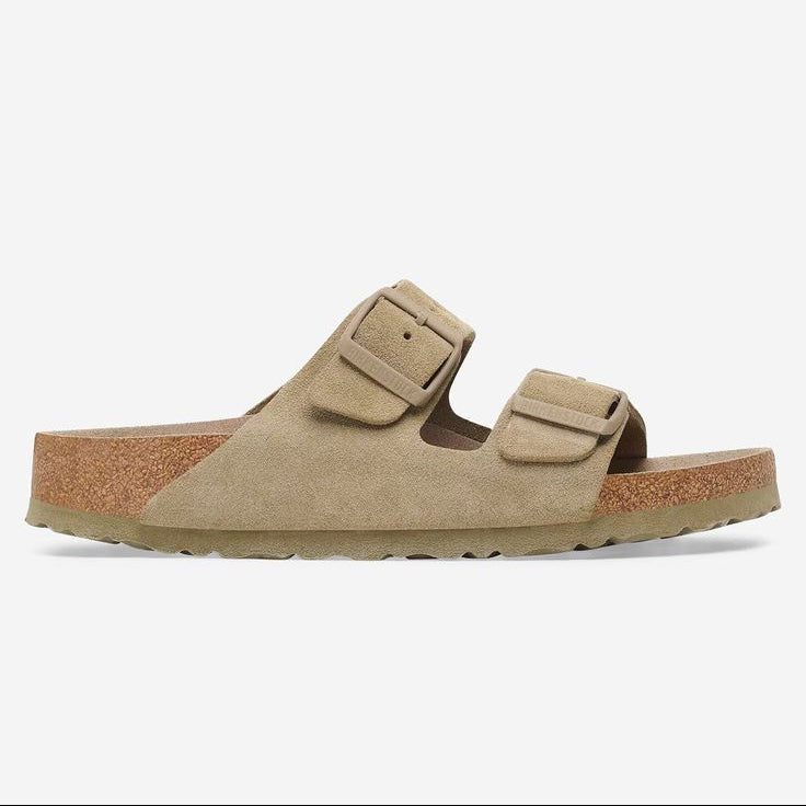 Beige sandal with cork sole on a white background